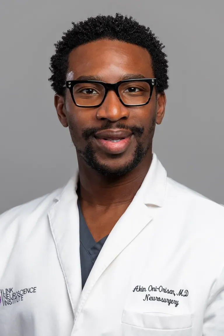 Dr. Akinwunmi Oni-Orisan, neurosurgeon and spine surgeon at Performance Sports and Spine